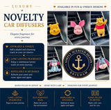 Promotional graphic for novelty car diffusers featuring plush character diffusers including Winnie the Pooh, Piglet, Tigger, and Eeyore mounted on a car air vent. The design includes branding for 'Simply Scented Devon Brixham' and highlights product features such as long-lasting fragrance, refillable reusability, and hand-filling in Devon.